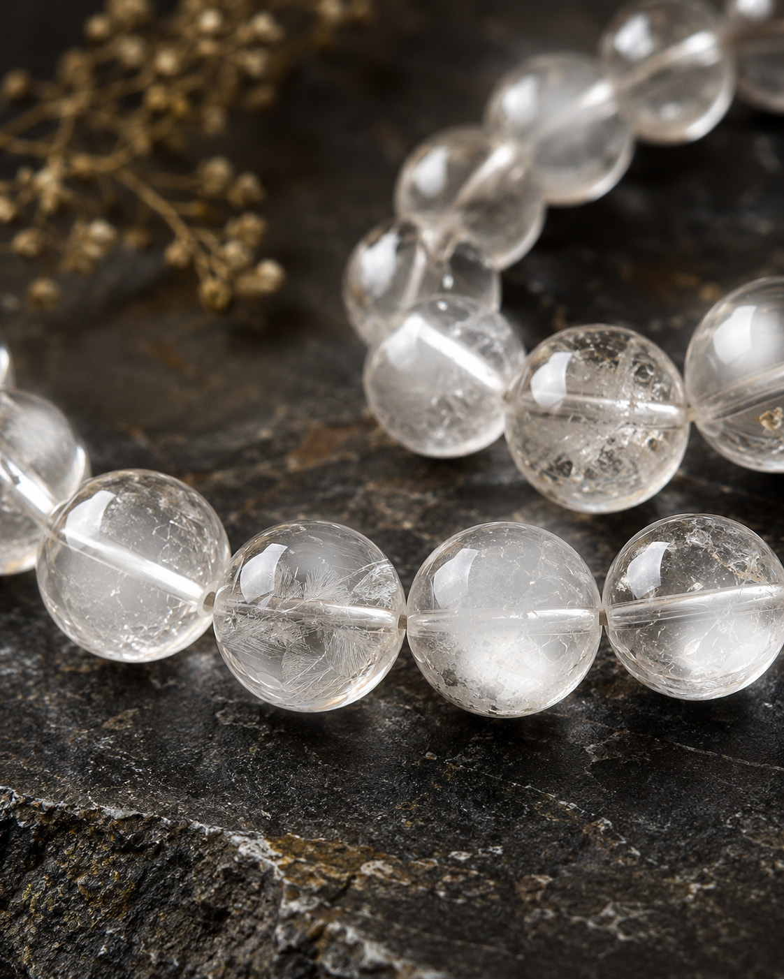 Macro photograph of genuine Sphatik beads showing natural inclusions and clarity variations